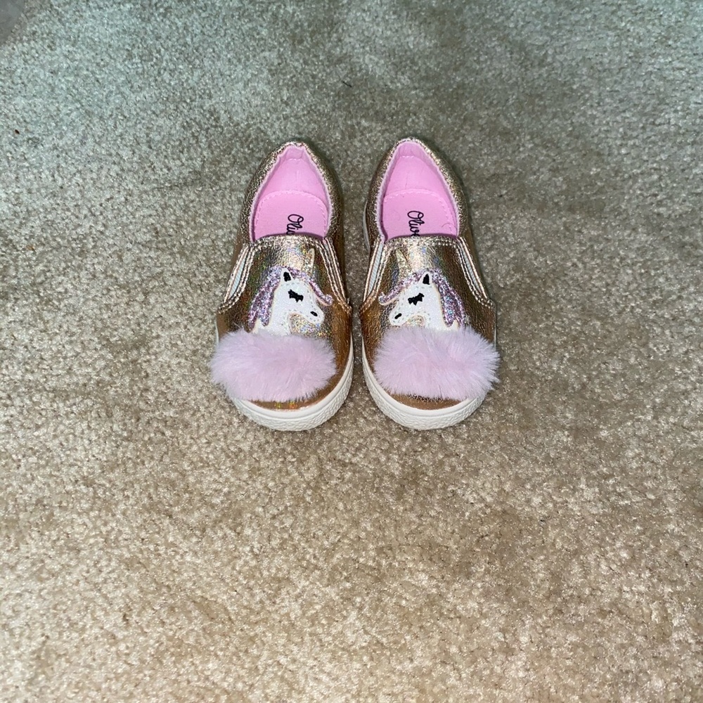 Girls toddler size 5 unicorn shoes.